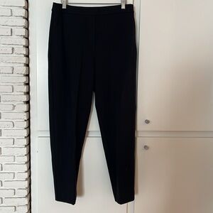 St. John. Knit pants. Black. Size Small. Lined Side seam pockets. New w tags.